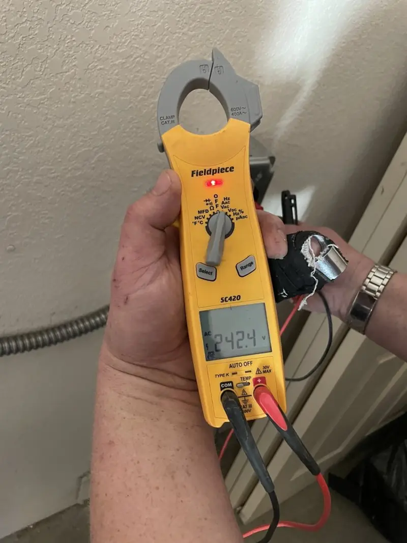 Voltage testing with clamp meter during Electrical Installation Services in Del Mar